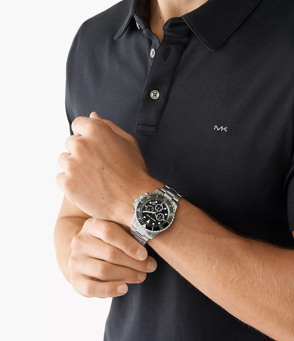 Michael Kors MK8976 men's watch worn on wrist with black dial and green bezel detail