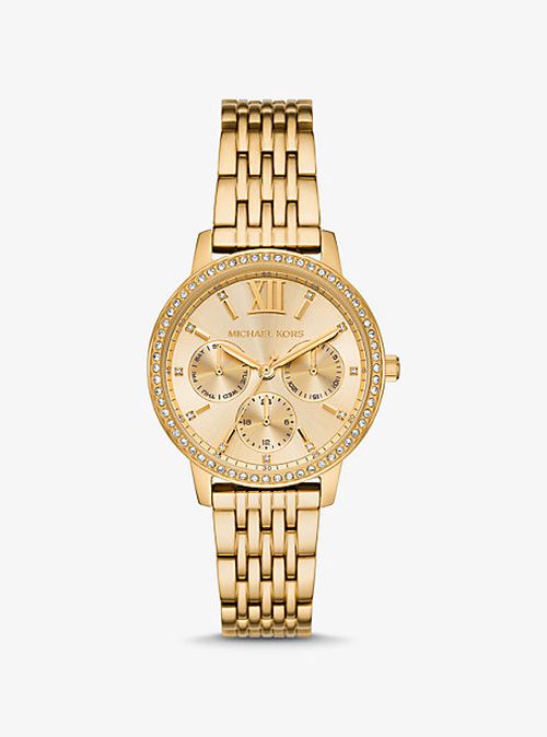 Michael Kors gold ladies watch with crystal bezel and Roman numeral dial on gold bracelet