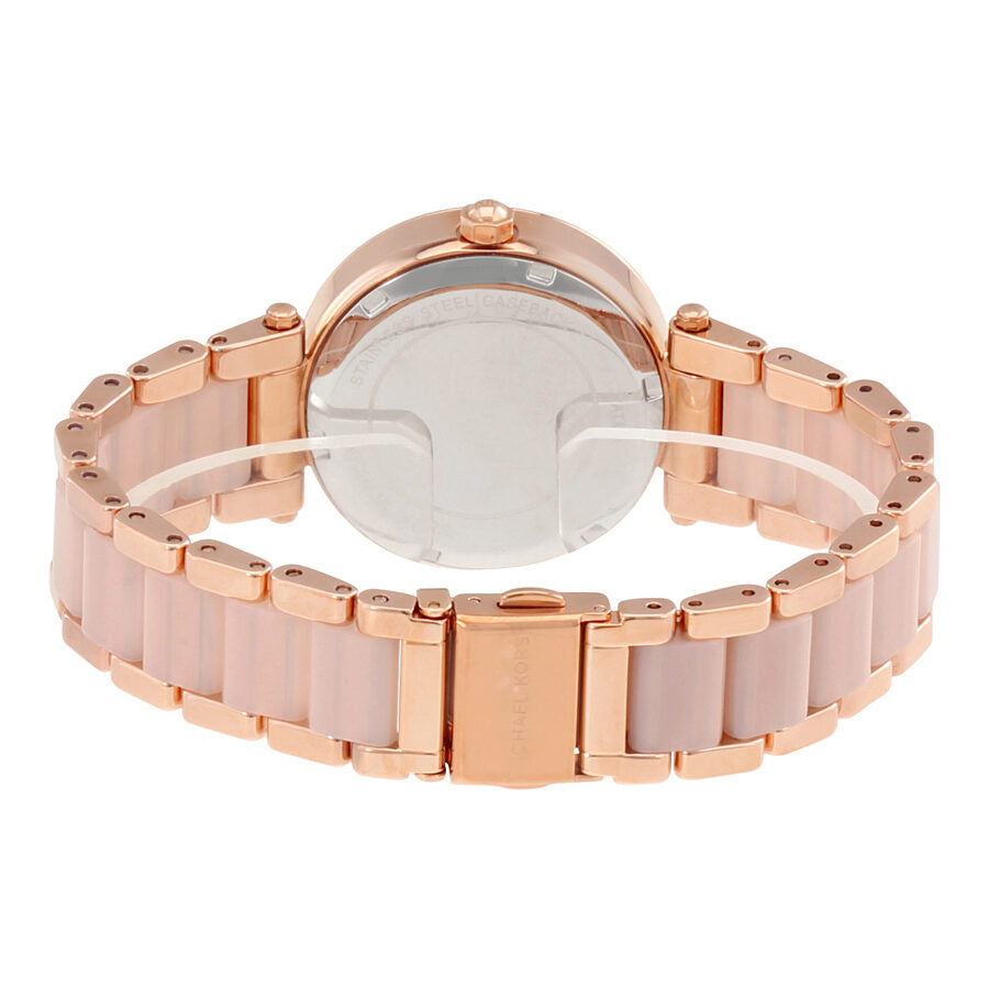 Michael Kors Parker Mini watch caseback showing rose gold and blush ceramic strap