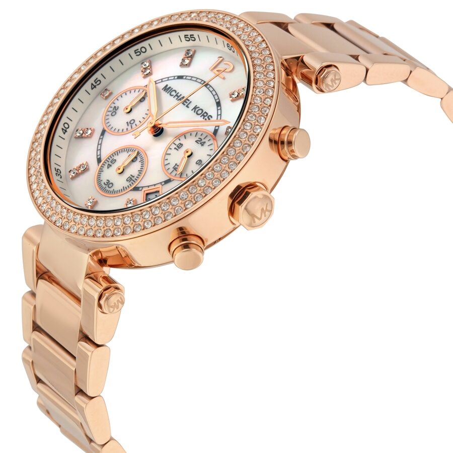 Michael Kors Parker rose gold chronograph watch side view showing three pushers and rose gold link bracelet