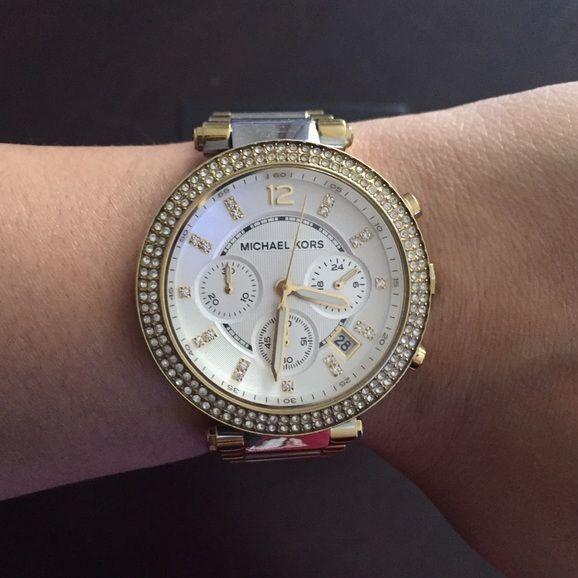 Michael Kors Parker chronograph watch worn on wrist with silver dial and crystal bezel