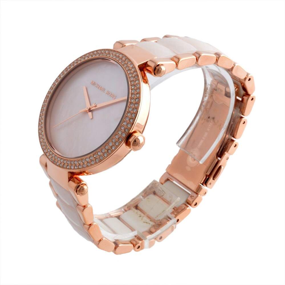 Parker watch at angle showing rose gold case, bracelet, and crystal bezel detail