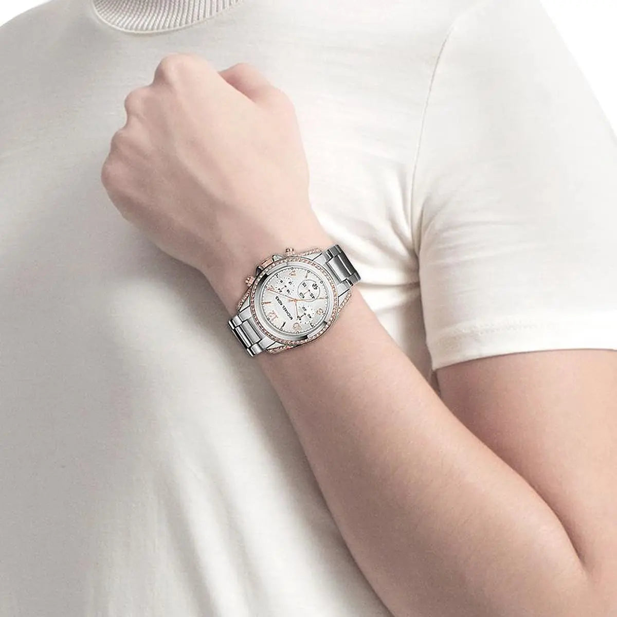 Michael Kors Runway MK5459 chronograph watch worn on wrist showing dial and stainless steel band