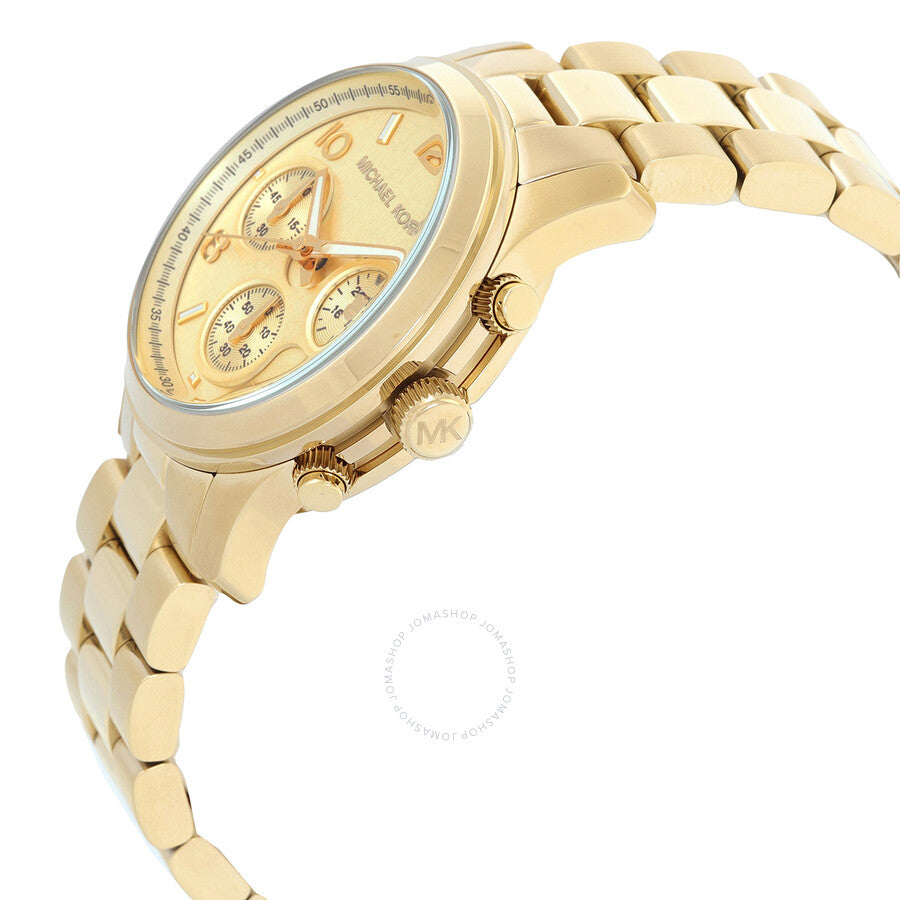 Michael Kors Runway chronograph watch side view showing gold case, pusher buttons, and three-link bracelet