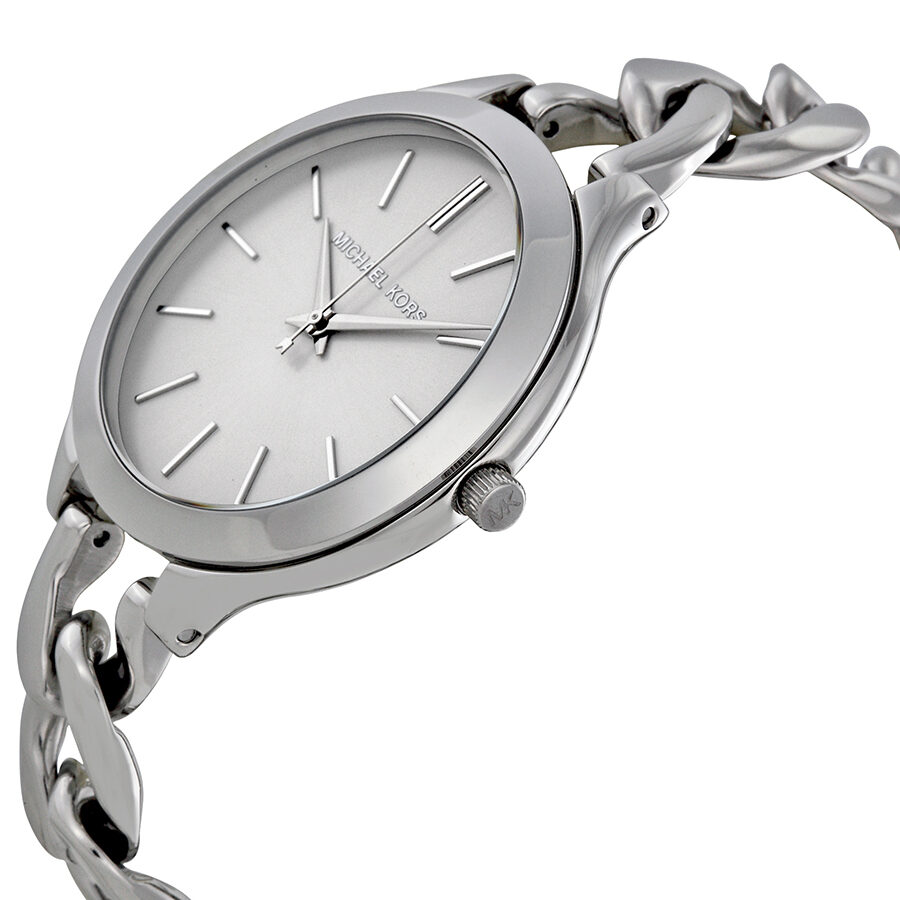 Angled view of Michael Kors Slim Runway watch showing white dial and chunky chain bracelet