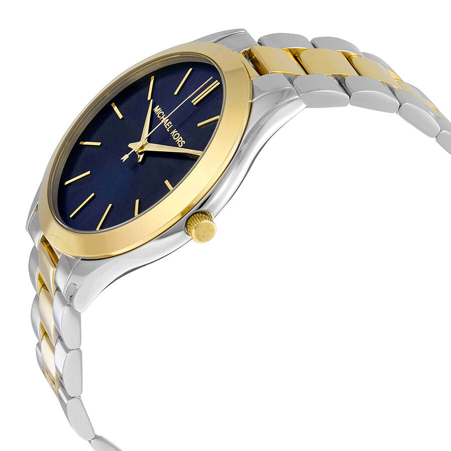 Side angle view of Michael Kors Slim Runway watch with two-tone bracelet and blue dial
