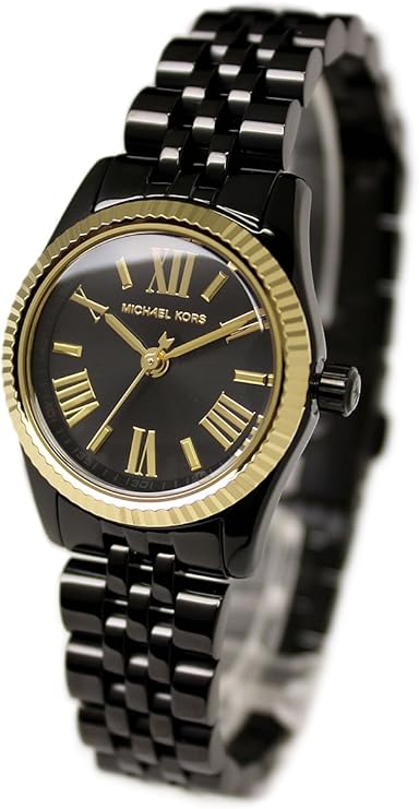 Michael Kors Lexington MK3299 black ion-plated women's watch with gold-tone bezel on wrist
