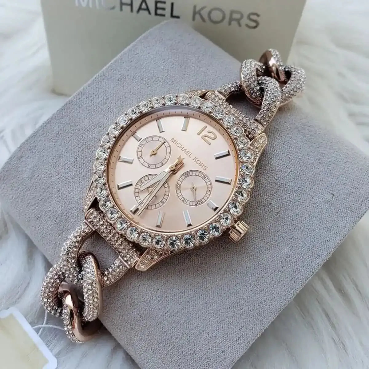 Michael Kors Pyper Gen 4654 watch on gray cloth with packaging