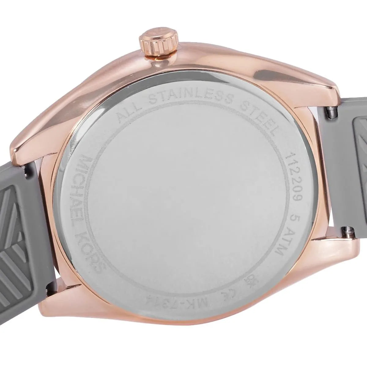 Caseback view of Michael Kors Janelle watch with engraved text and stainless steel construction