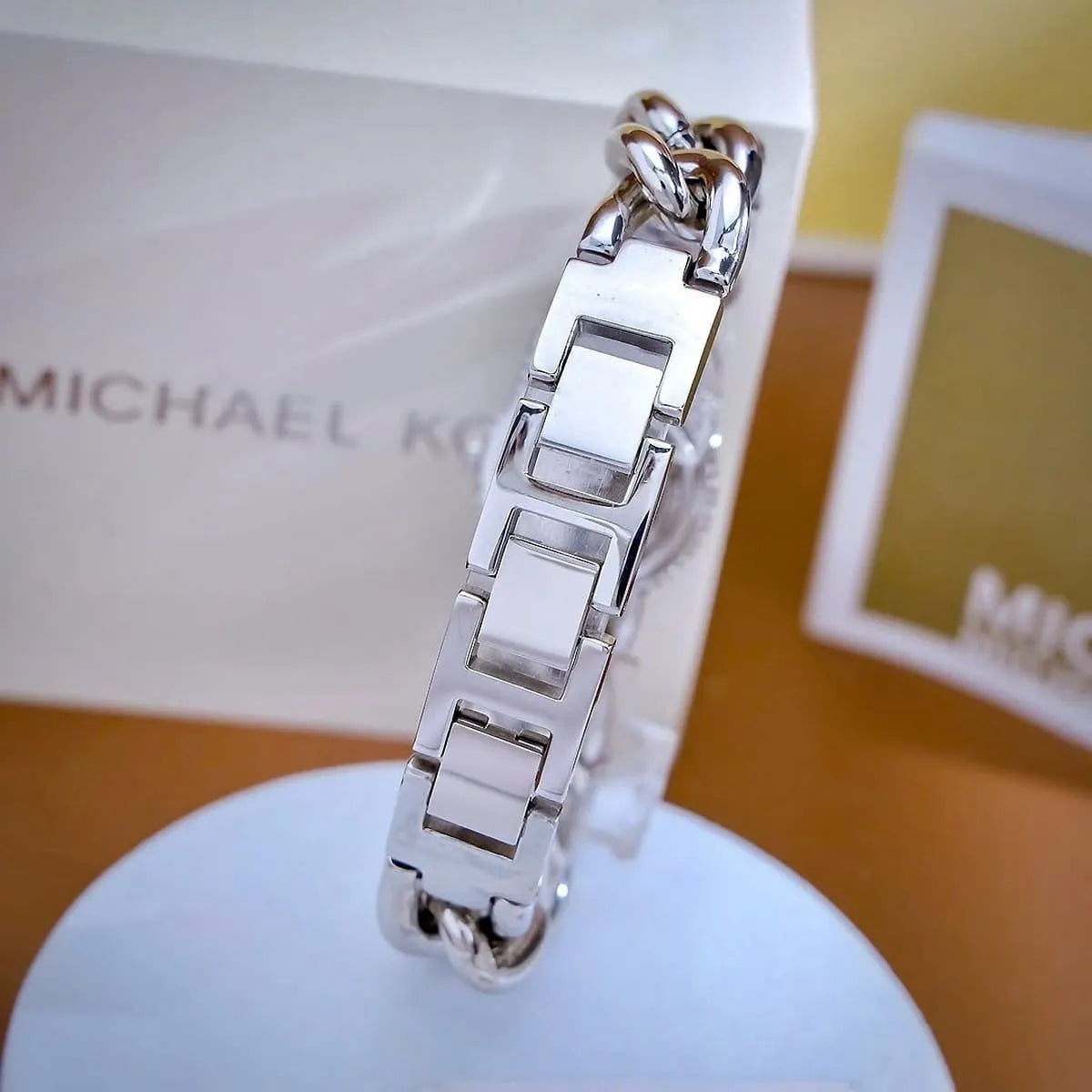 Michael Kors Liliane watch strap detail showing chain and metal links