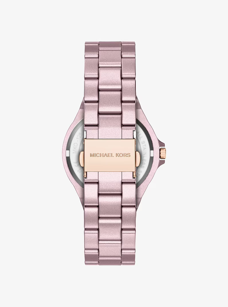 Case back of Michael Kors Mini Lennox watch showing gold-tone bracelet with clasp