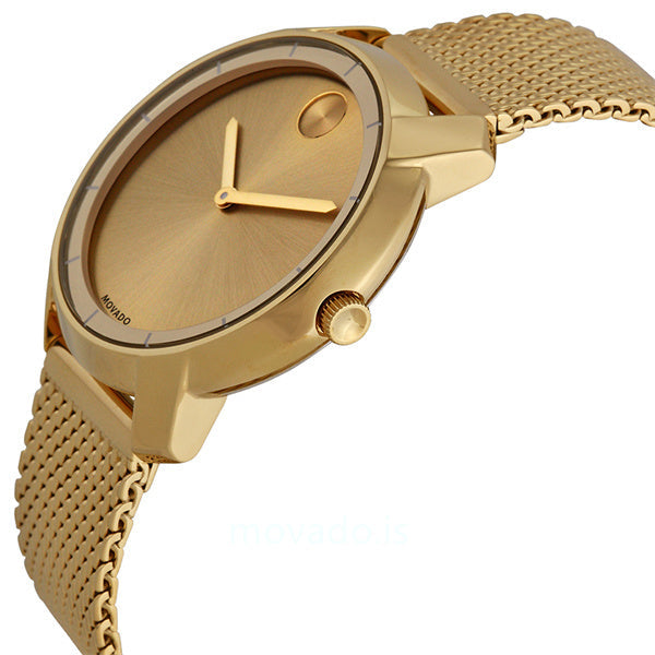 Movado Bold women's watch on wrist showing gold dial and mesh strap
