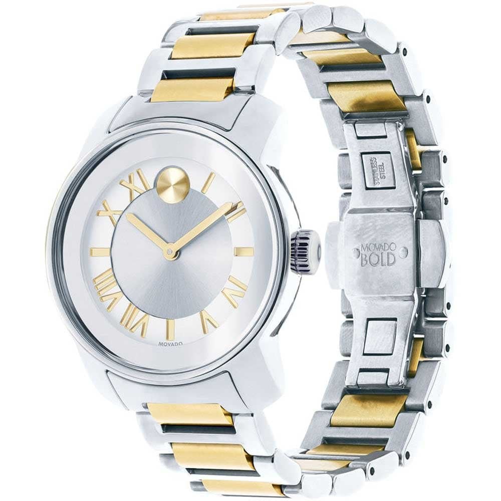Movado Bold two-tone women's watch on wrist displaying silver dial and mixed metal bracelet