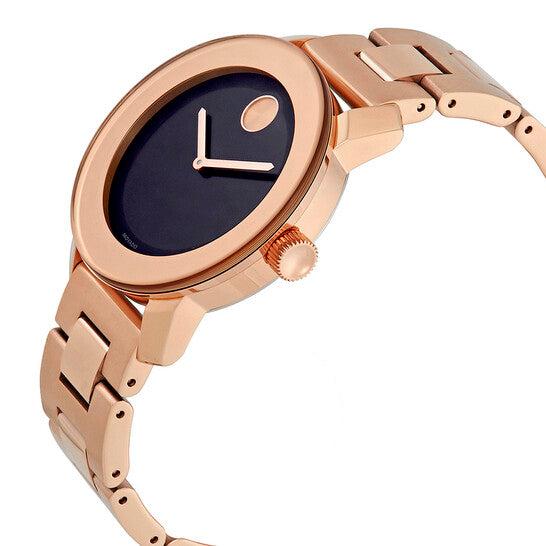 Movado Bold rose gold-tone watch on wrist showing black dial and case