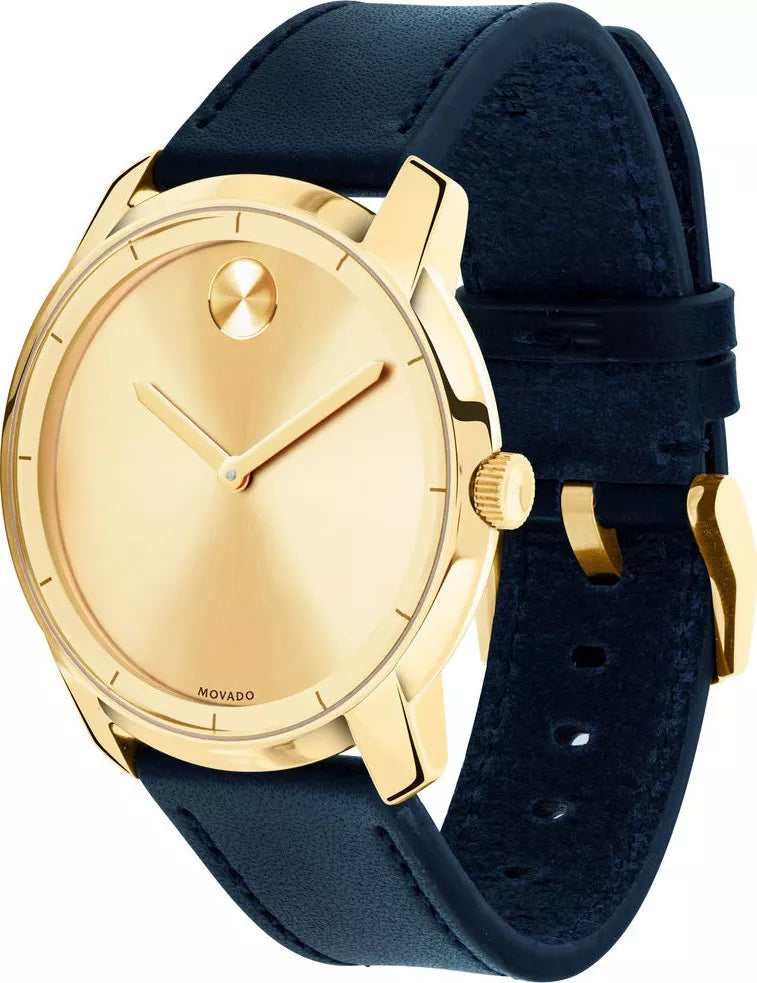 Movado Bold yellow gold watch with navy leather strap shown at angle