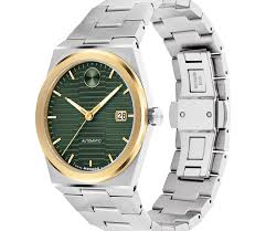 Side angle view of Movado BOLD Quest watch with green dial, two-tone case, and stainless steel bracelet