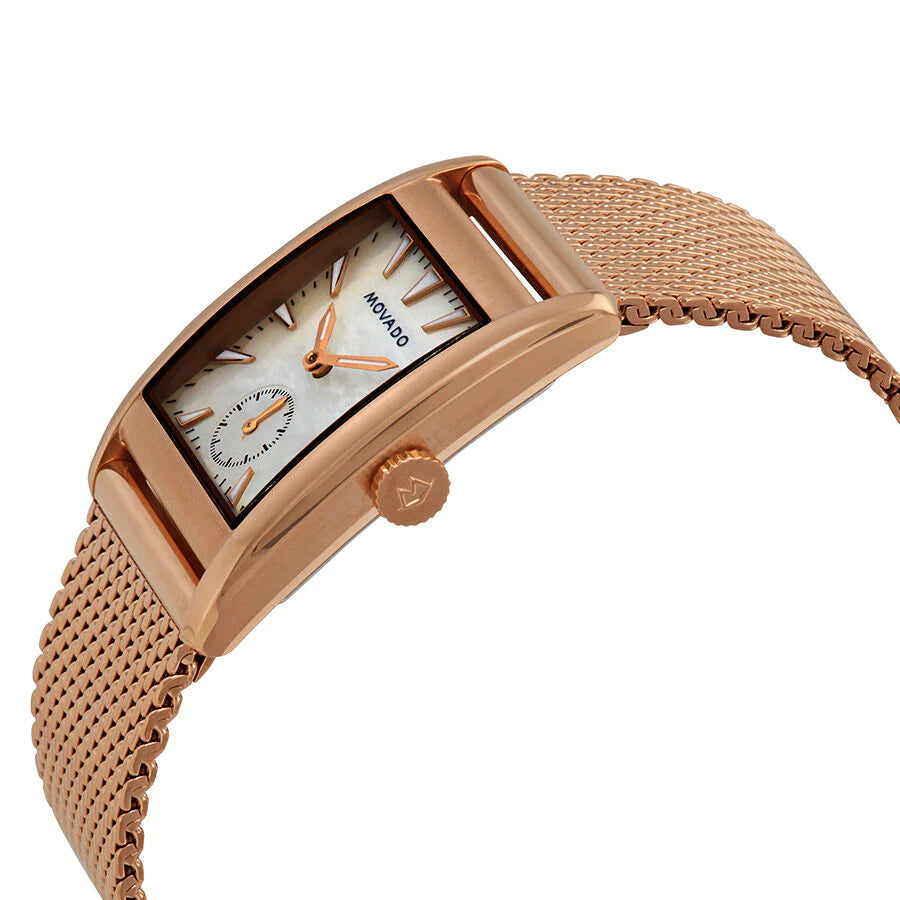 Movado Heritage women's watch on wrist displaying white dial and rose gold mesh bracelet