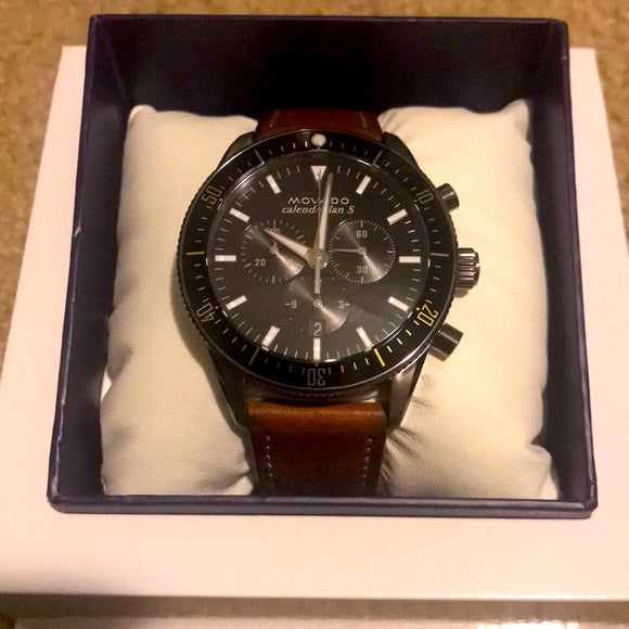 Movado Heritage Chronograph watch presented in navy blue box with white cushion