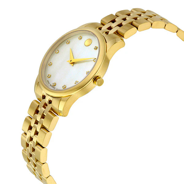 Movado Museum Classic gold watch on wrist with mother of pearl dial and diamond hour markers