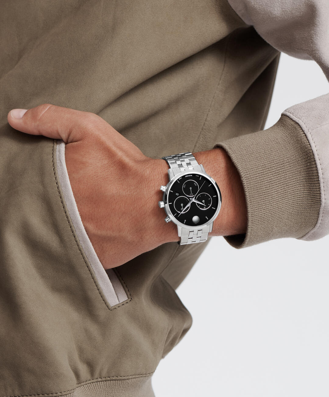 Movado Museum Classic chronograph watch worn on wrist with black dial and stainless steel band