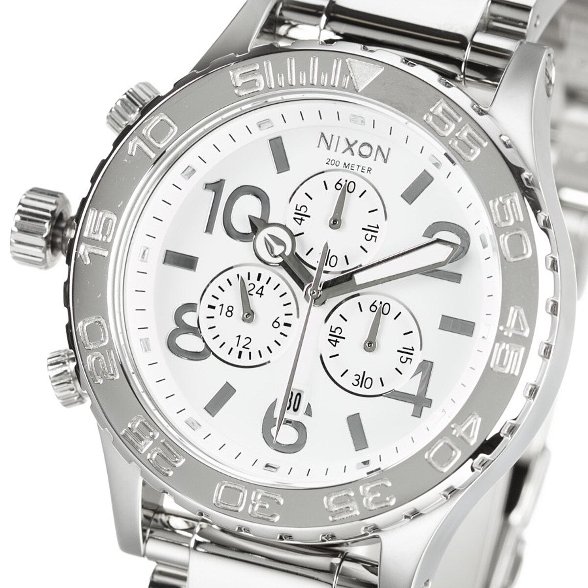 Close-up dial view showing white chronograph subdials with numerals and steel bezel