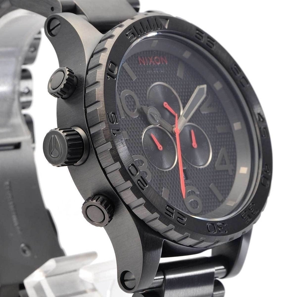 Nixon 51-30 Chrono side angle showing black case, bezel, and push buttons
