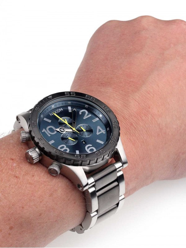 Nixon 51-30 Chronograph worn on wrist displaying blue dial with chronograph complications