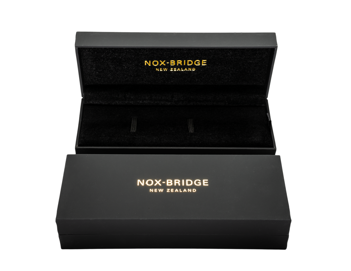 Noxbridge Revo watch packaging with black box and gold branding