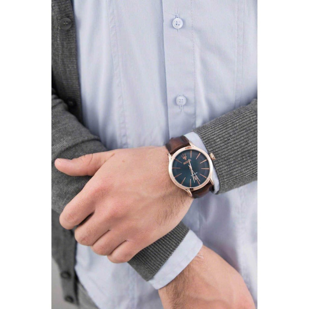 Maserati Epoca watch worn on wrist with gray and white jacket