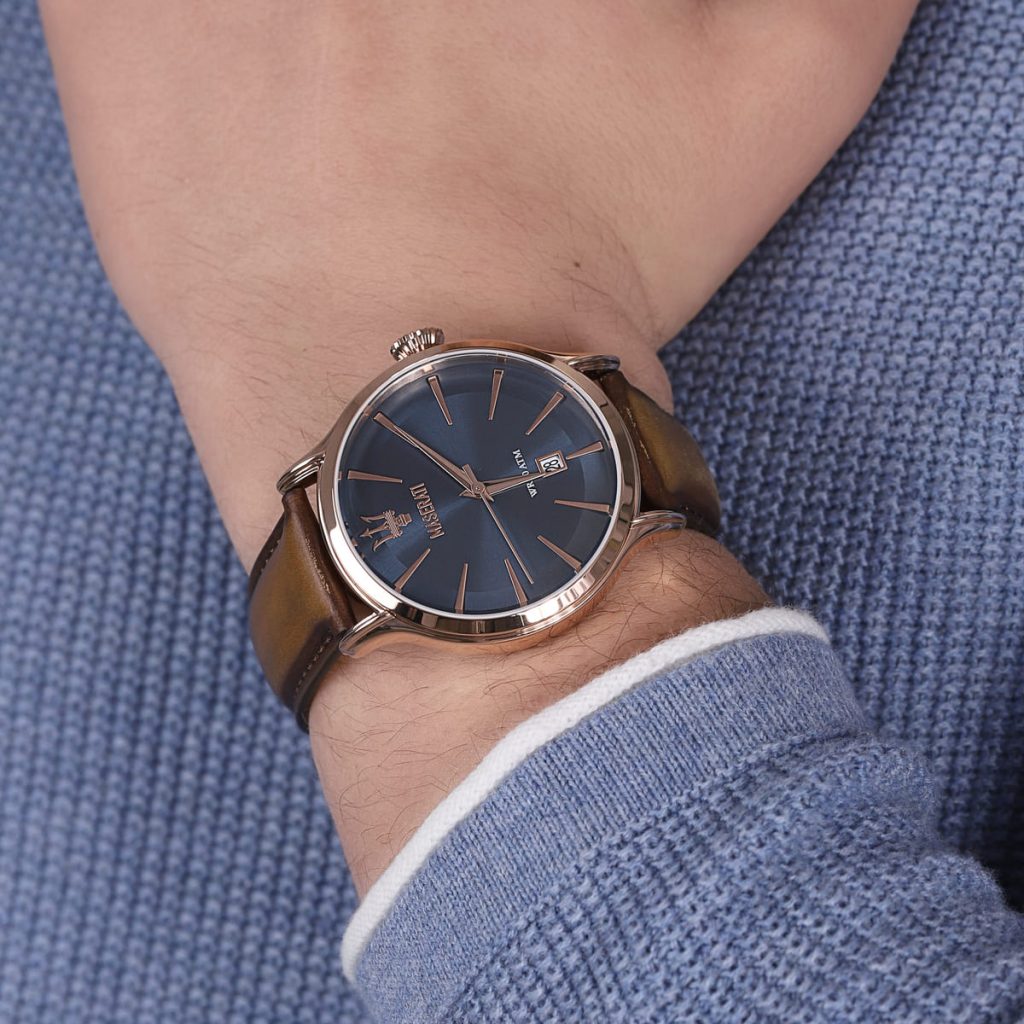 Maserati Epoca watch on wrist with blue fabric background