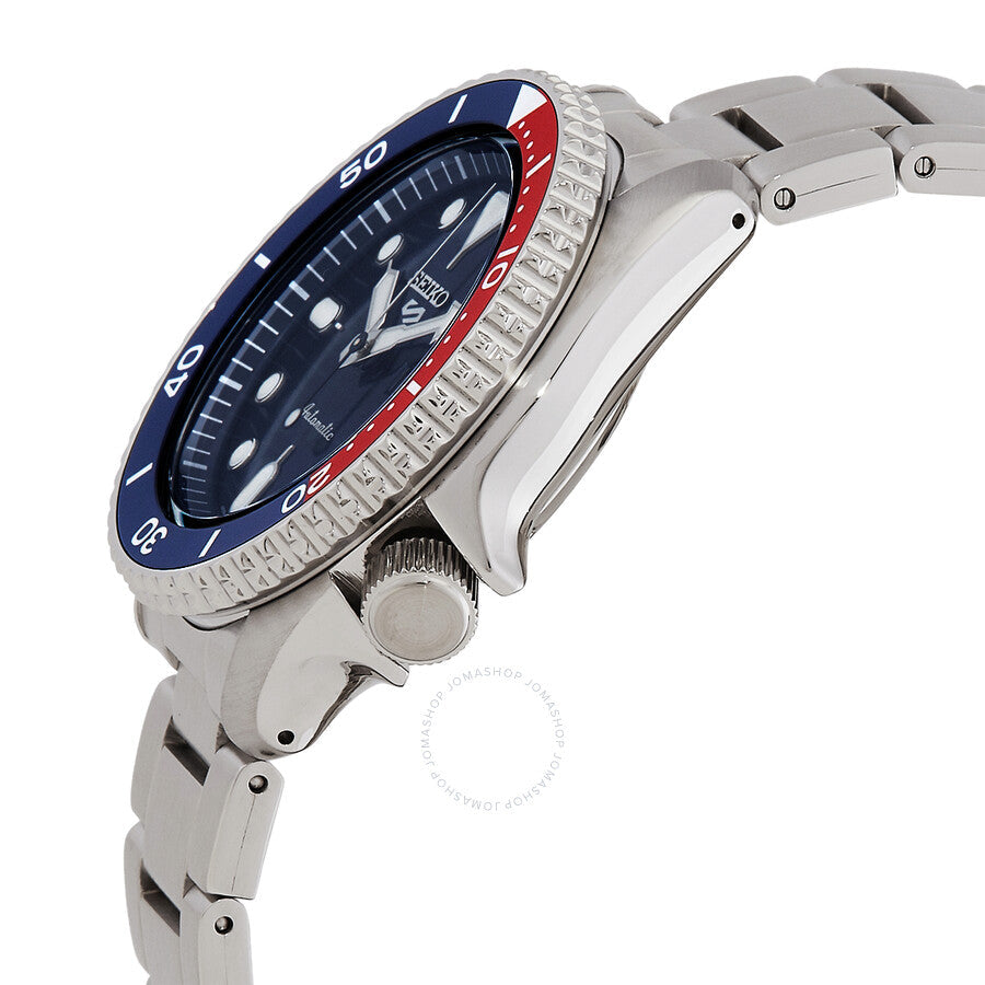 Side angle view of Seiko 5 Sports watch showing case profile, crown, and pepsi bezel detail