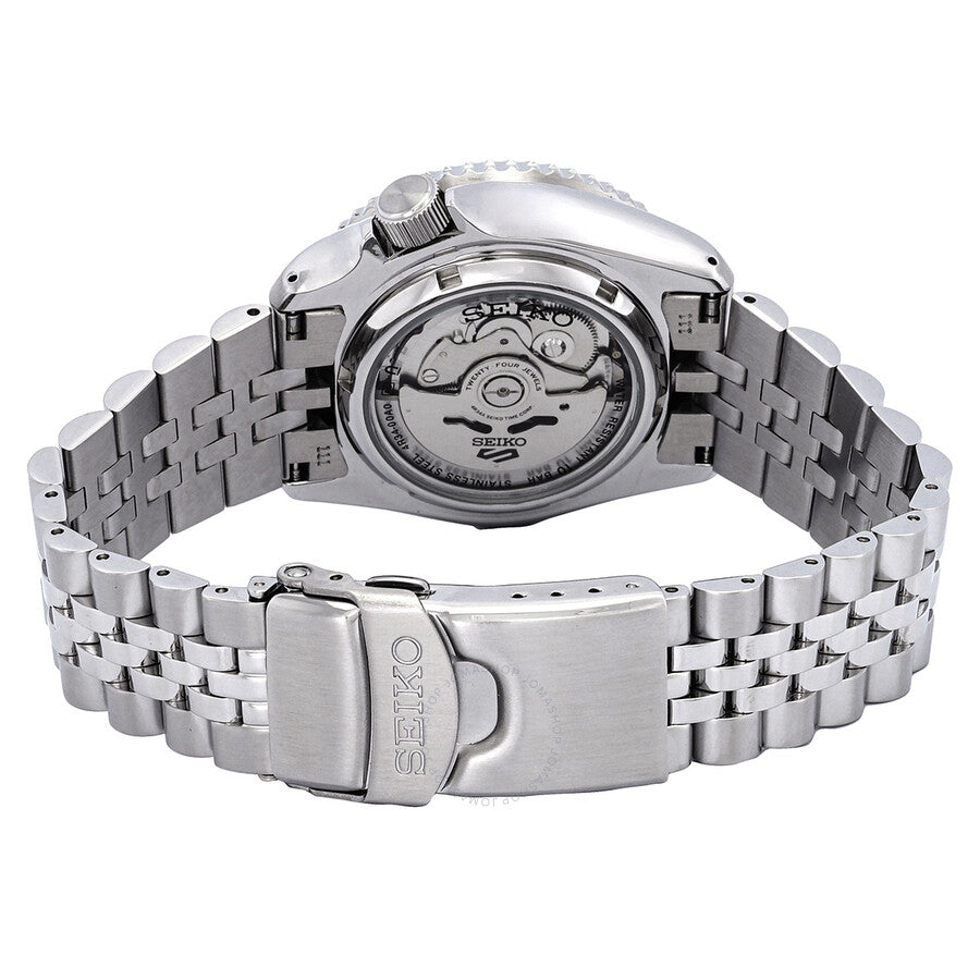 Seiko 5 Sports automatic movement visible through transparent caseback with stainless steel bracelet