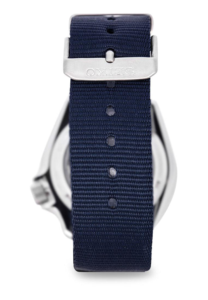 Seiko 5 Sports SRPD51K2 navy nylon NATO-style strap with white keeper and stainless steel hardware