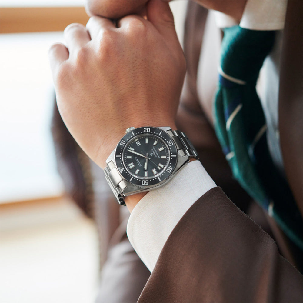 Seiko SPB143J1 diver watch worn on wrist with silver steel bracelet