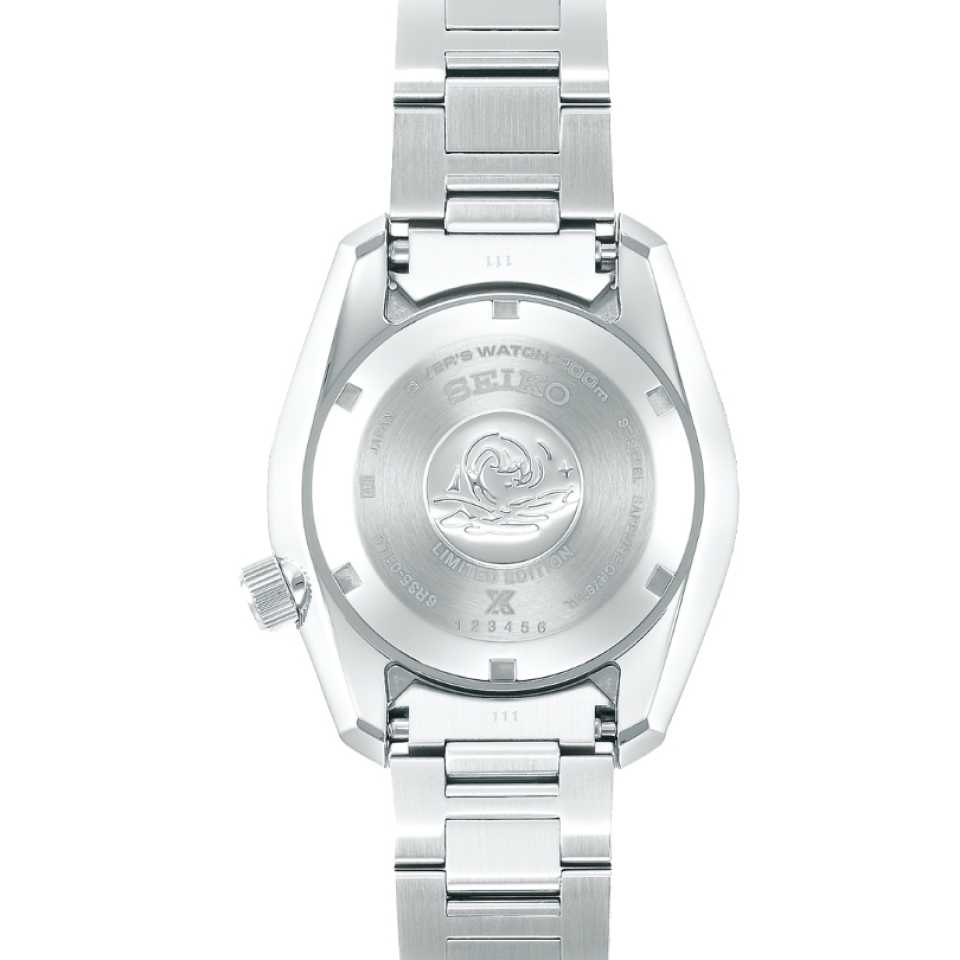 Seiko SPB207J1 caseback showing automatic movement and see-through display with Seiko branding and wave motif