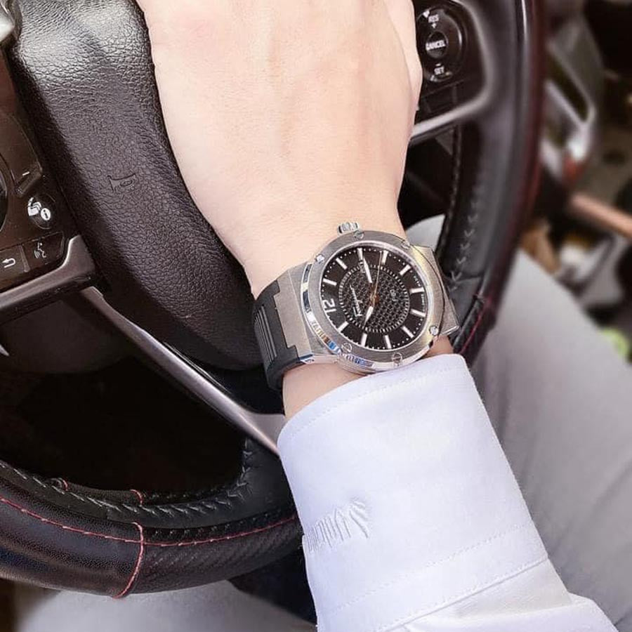 Ferragamo F-80 men's watch on wrist with black rubber strap and black dial