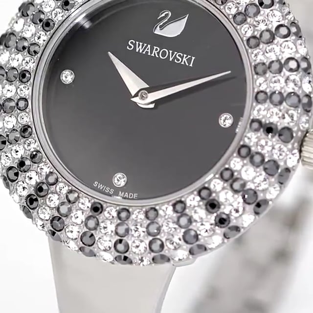 Close-up of Swarovski watch dial with crystal bezel and hour markers