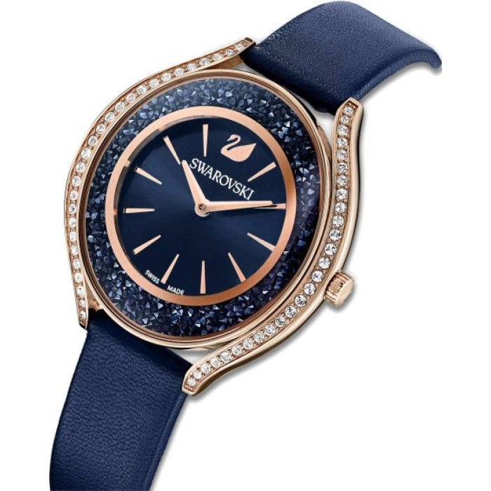 Swarovski Crystalline Aura watch at angle showing case and navy leather strap