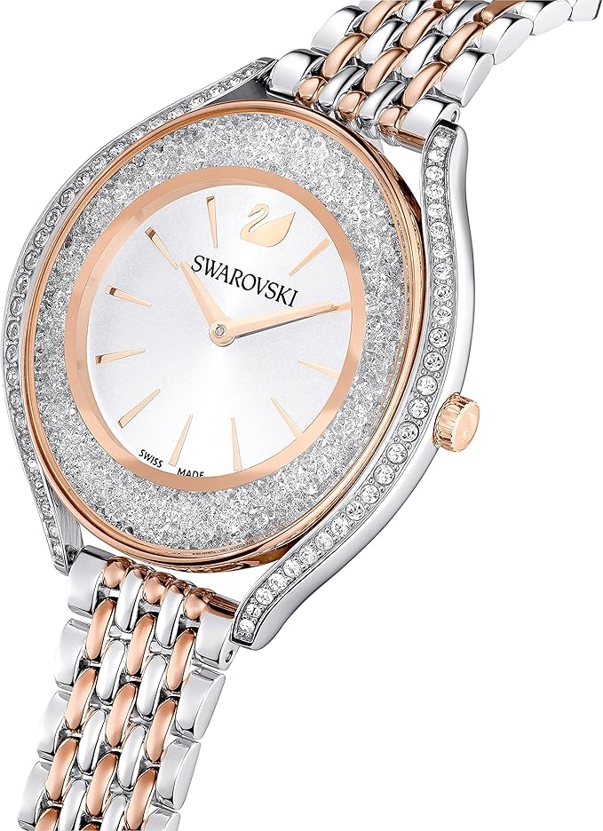 Angled view of Swarovski Crystalline Aura watch with rose gold and silver mixed-metal bracelet