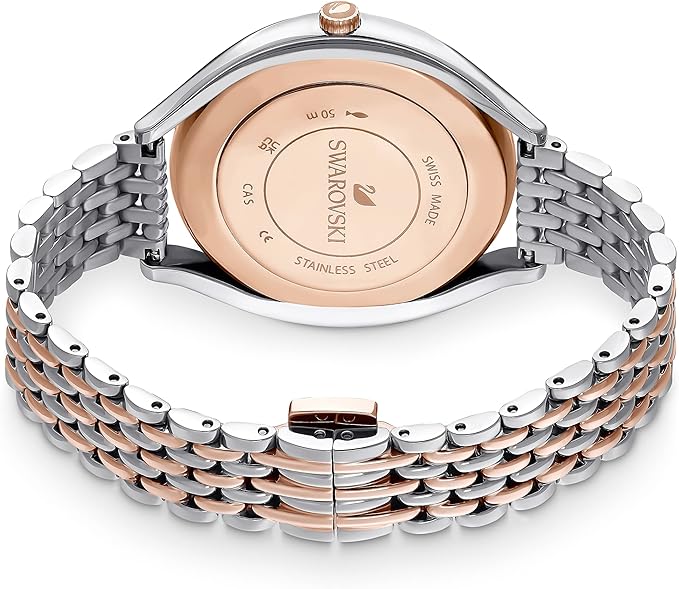 Case back of Swarovski Crystalline Aura watch displaying stainless steel and rose gold construction