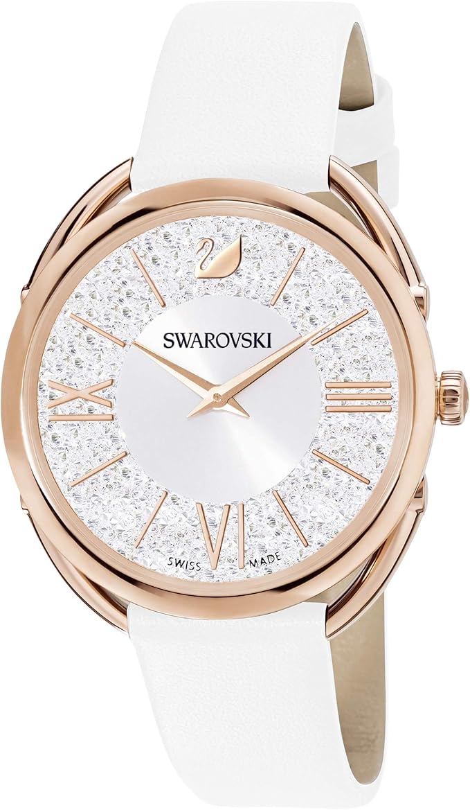 Angled view of Crystalline Glam watch showing rose gold case, crystal dial, and white strap