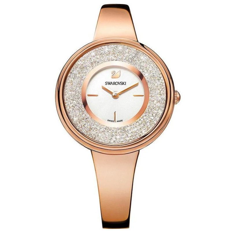 Swarovski Crystalline Pure watch with rose gold-tone case and metal bracelet, crystal-filled dial with white face
