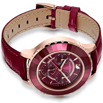 Overhead view of Swarovski women's watch displaying full dial and burgundy leather strap