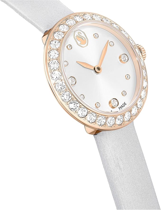Side-on view of Swarovski Matrix Tennis watch worn, featuring rose gold case and leather strap