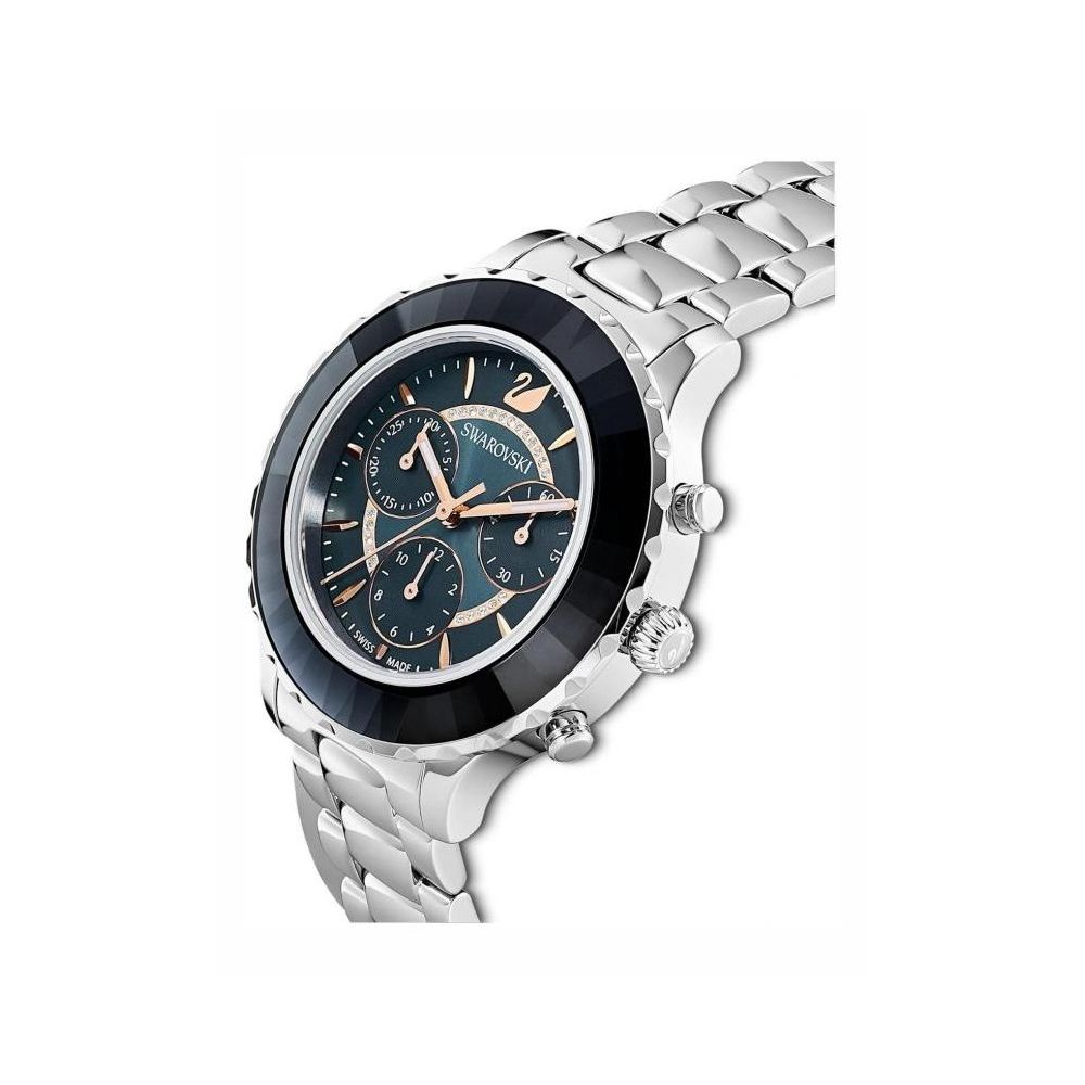 Swarovski Octea Lux Chrono angled view showing silver steel bracelet and navy bezel with chronograph dial