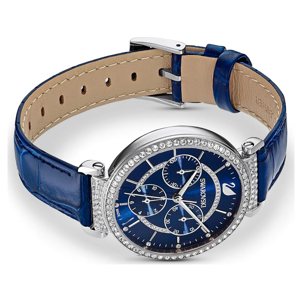 Swarovski Passage Chrono watch worn on wrist, displaying navy dial and blue crocodile-embossed leather strap