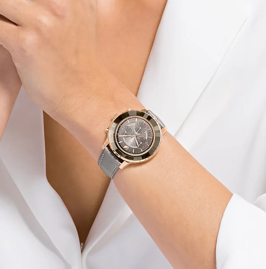 Swarovski Stella women's watch worn on wrist with gray strap and rose gold case