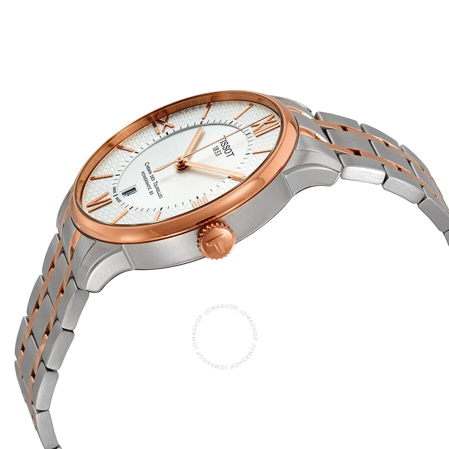 Tissot Chemin des Tourelles watch shown at side angle with two-tone metal bracelet and rose gold bezel