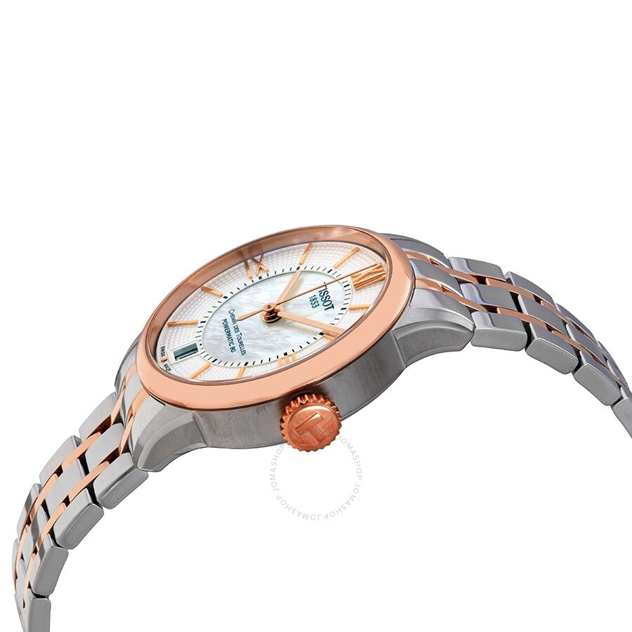 Angled side view of Tissot Chemin des Tourelles watch showing rose gold bezel and two-tone bracelet