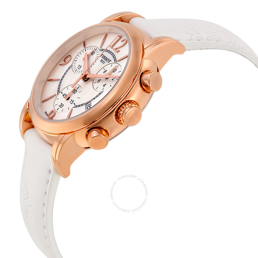 Angled side view of Tissot Dressport chronograph watch with rose gold case and white strap